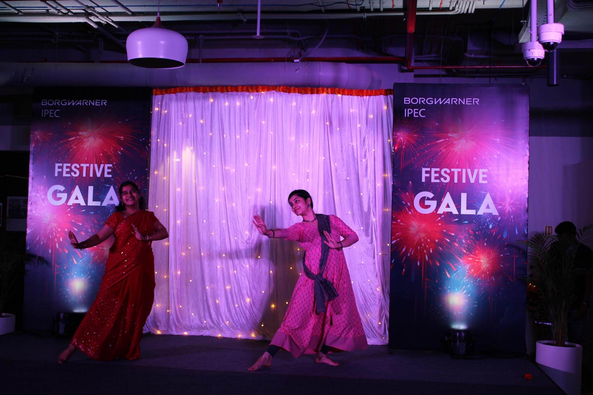 two women dancing on a stage