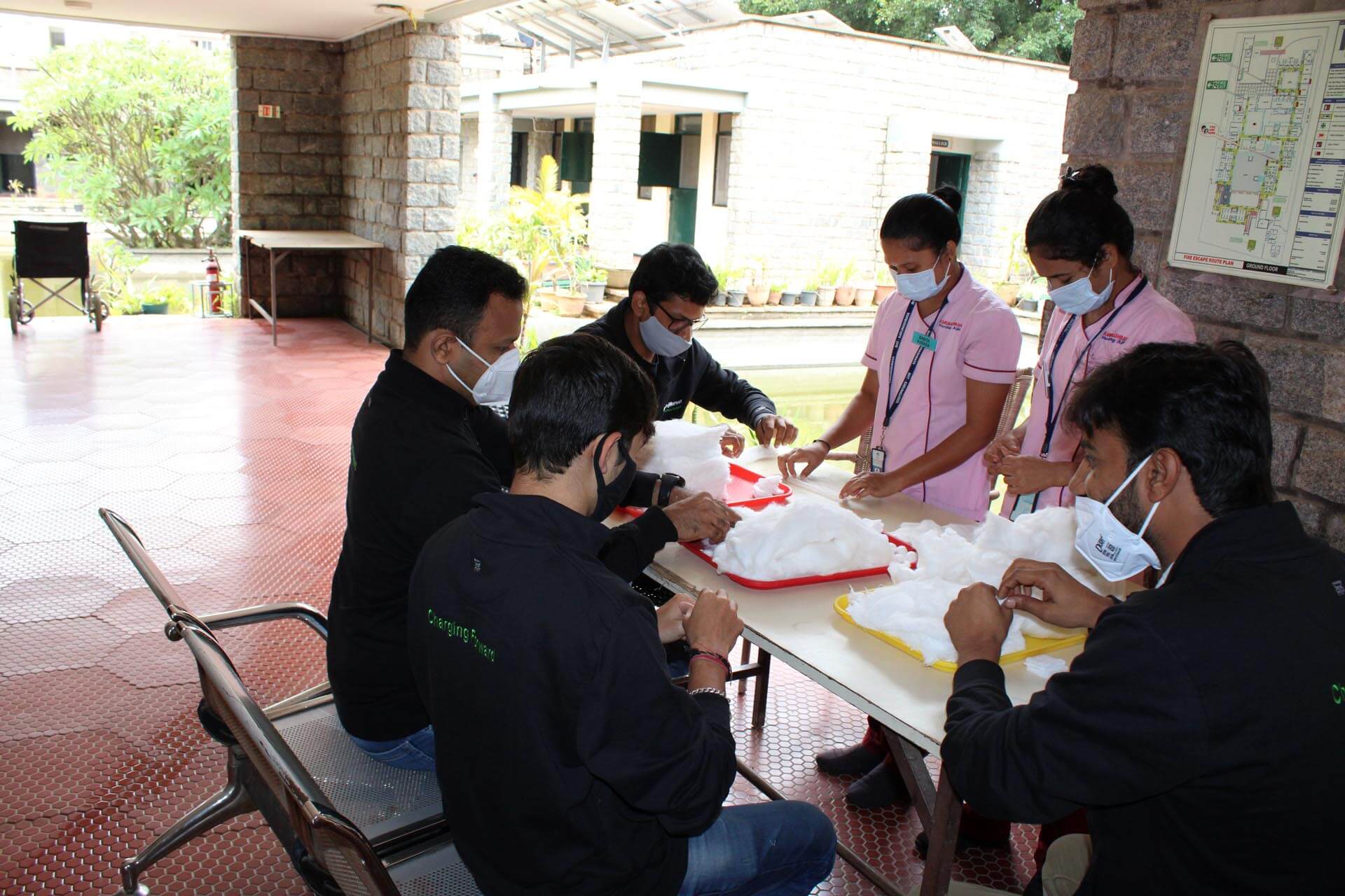 a group of people wearing masks