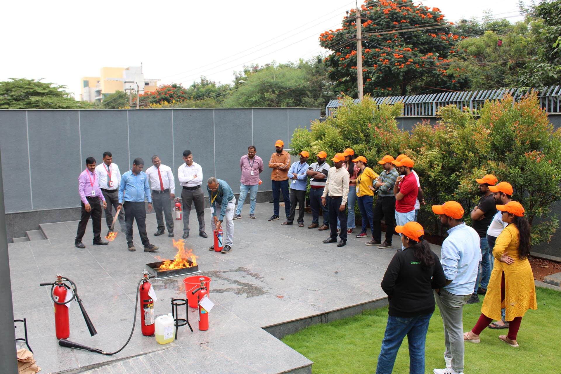 a group of people putting out a fire