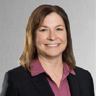 a woman in a black suit