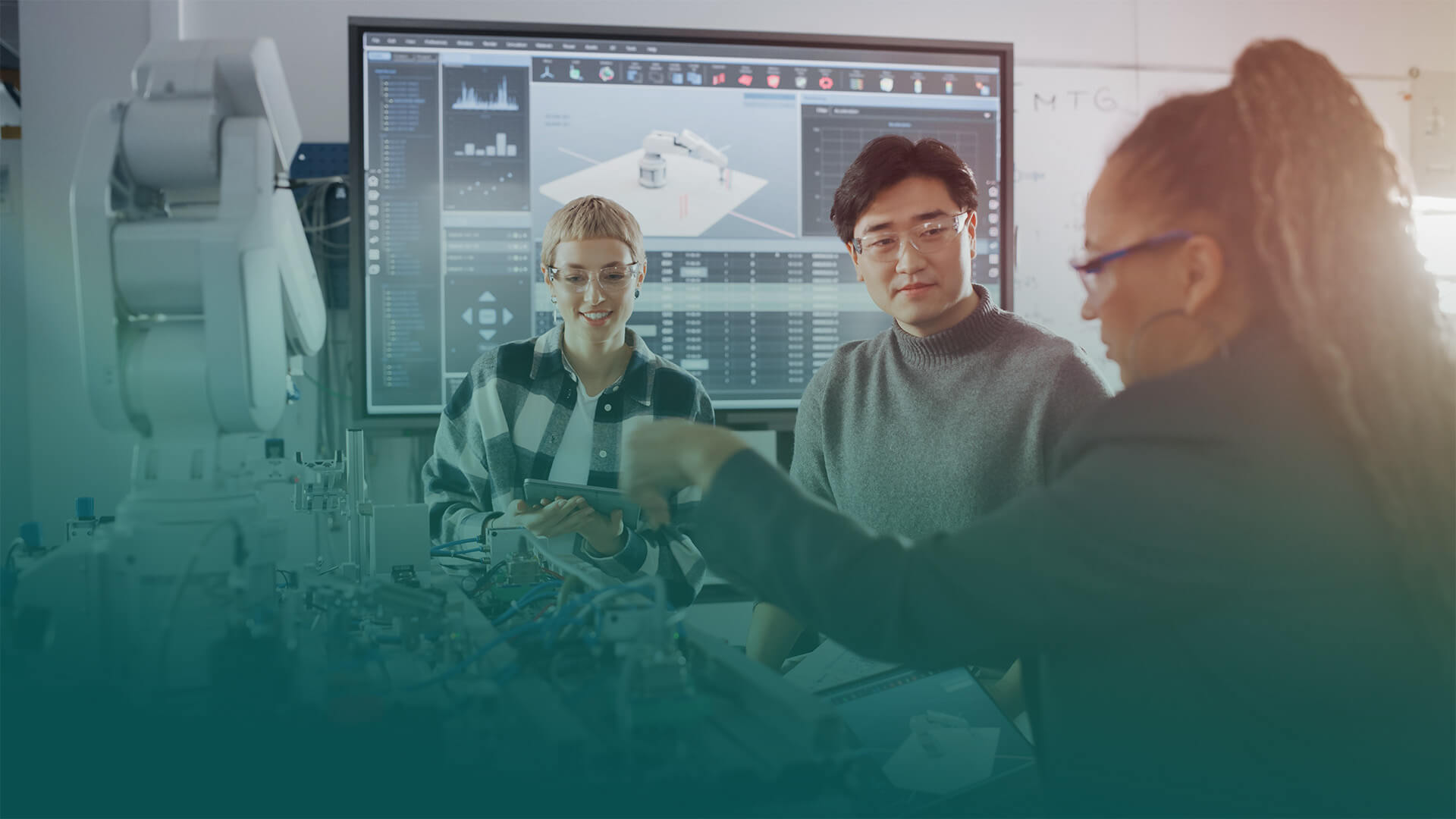 a team of cross-cultural engineers at work