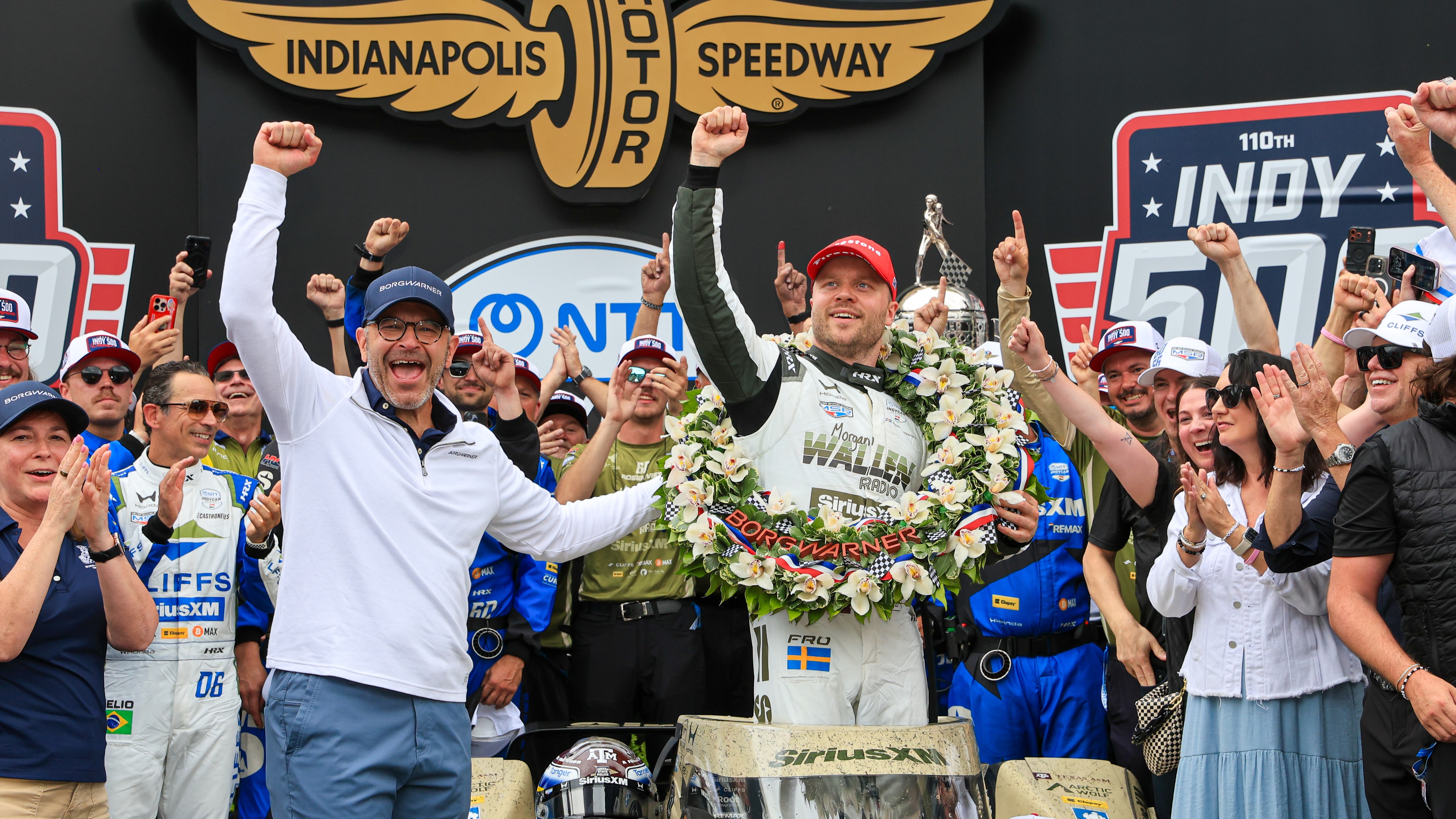 People celebrate in Victory Circle at the 2026 Indianapolis 500