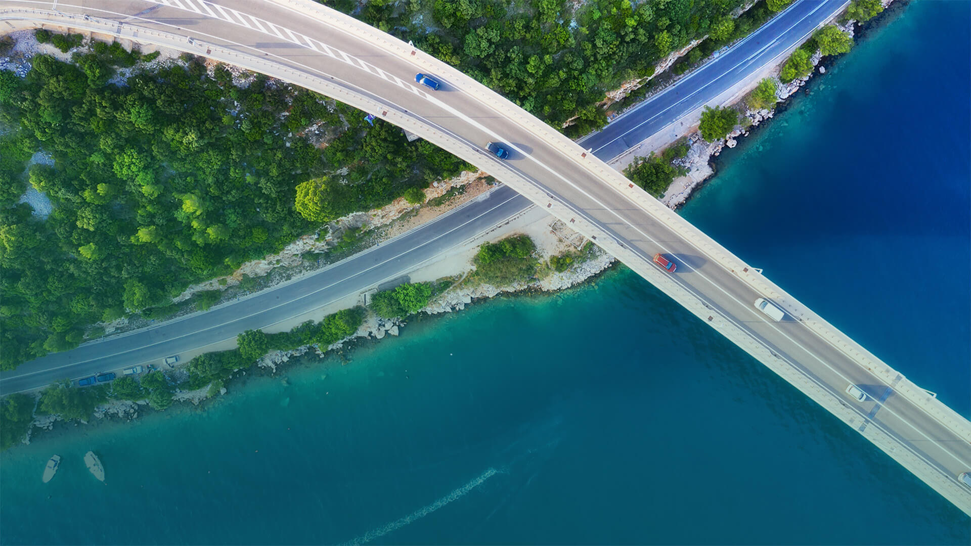 a bridge over an ocean shore