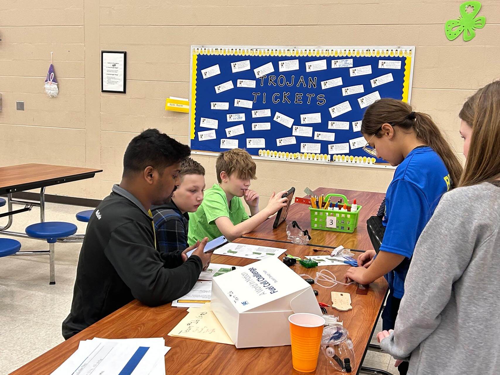 a group of people sitting at a table