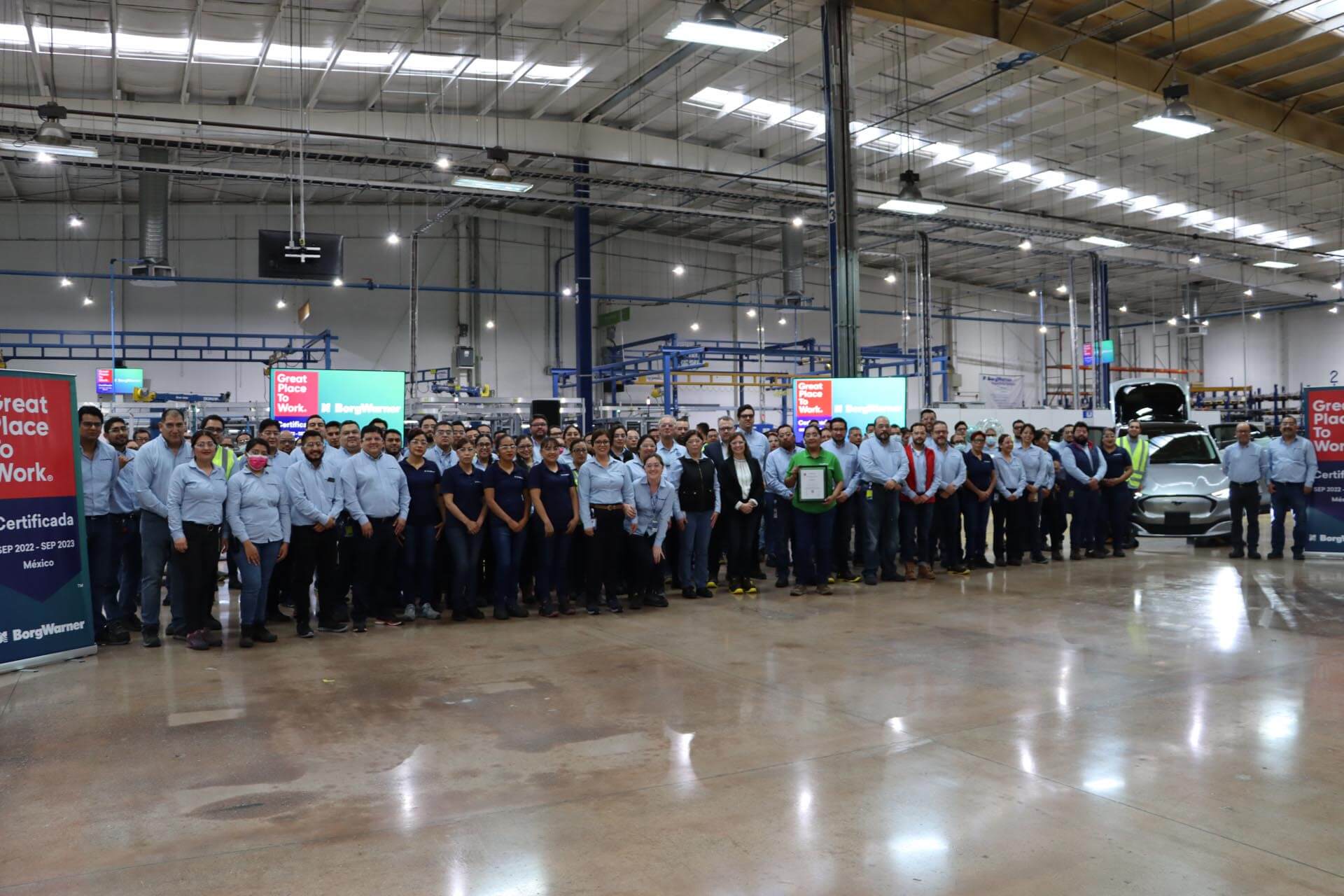 a group of people in a factory